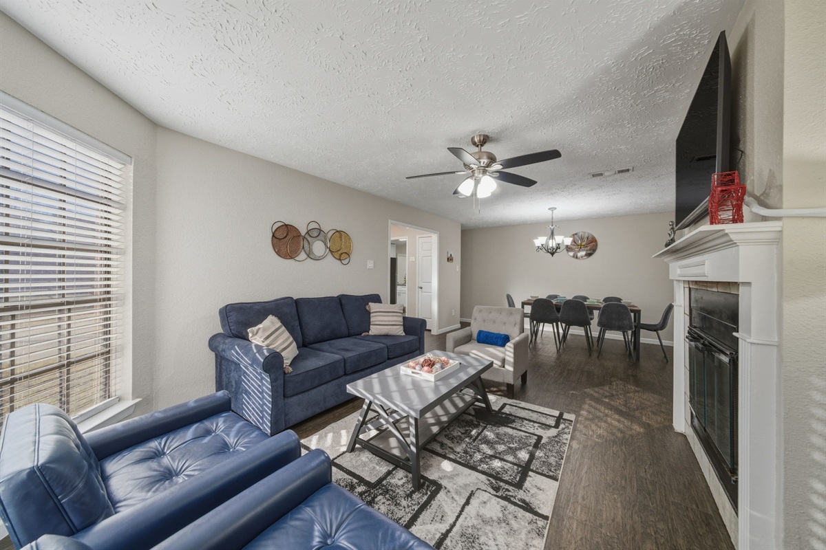 Cozy living room with large TV — perfect for movie nights.