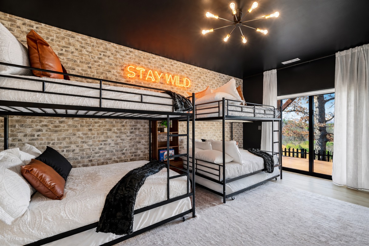 {Bunk Room}
Built for the whole group — 4 full-over-full bunks plus 2 twin trundles create a fun, comfortable space where everyone has a spot and the energy stays high.