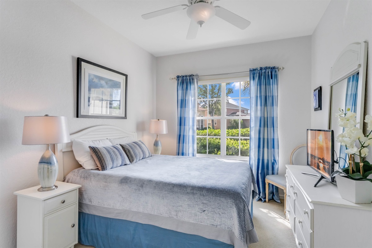 The first floor queen bedroom is just across the hall from the first floor share bath.