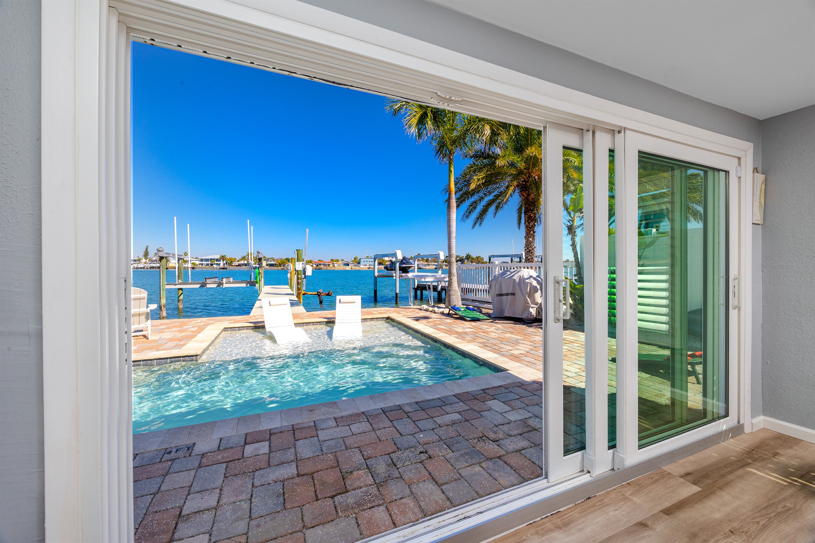 Living Room Opens Right up to the Pool!
