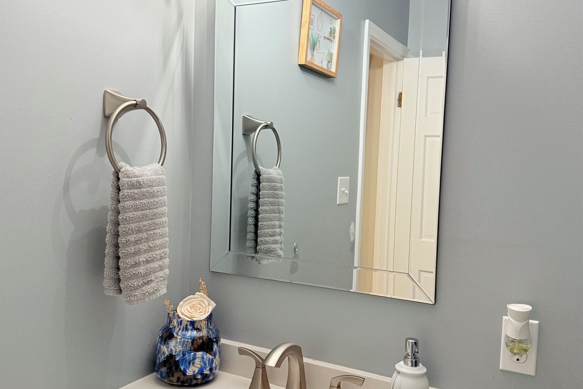 Ensuite bathroom with double towels and neutral tones — clean, simple, and calming. 