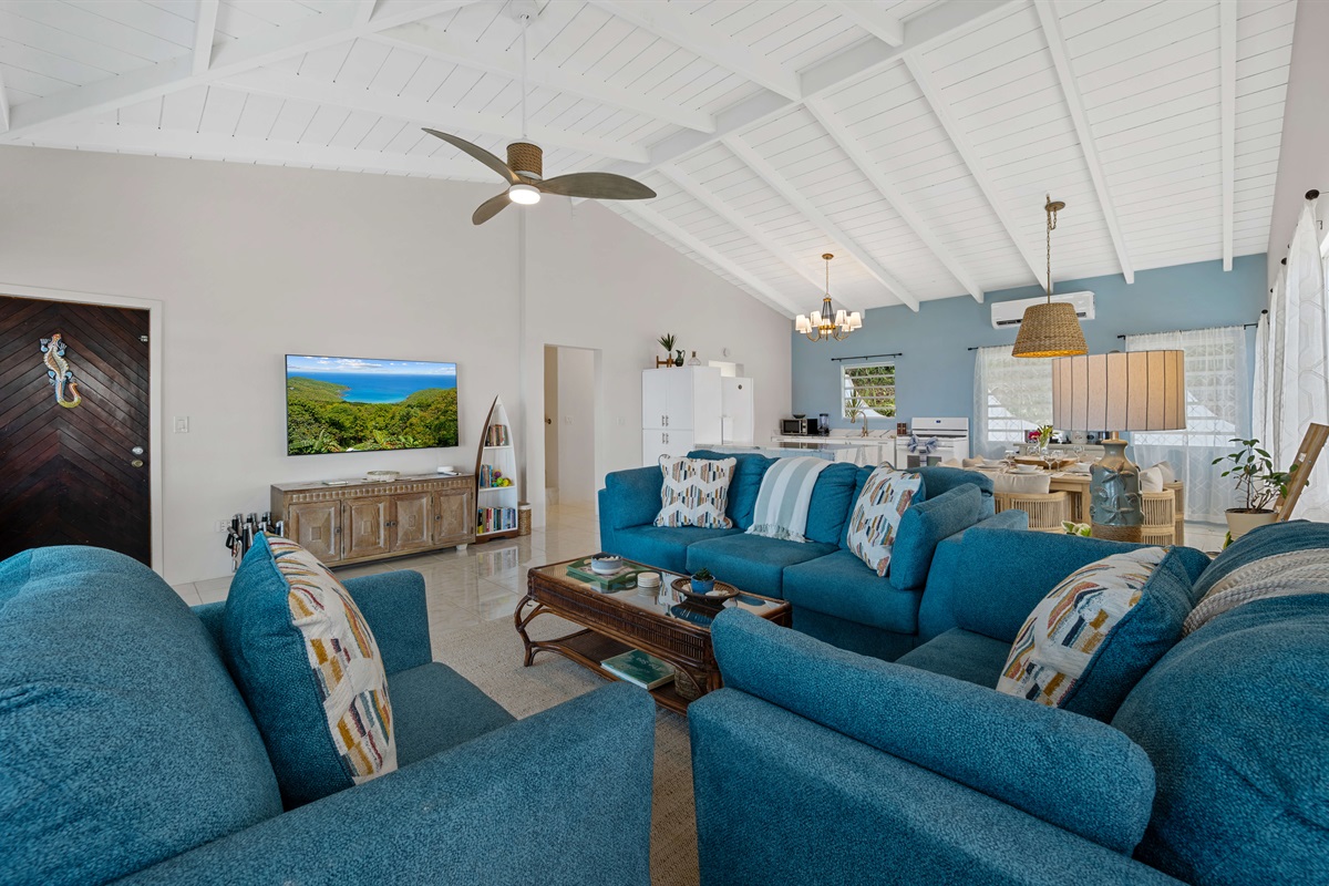 Plenty of seating for the whole group. The wooden door on the left leads to a set of stairs that bring you down to the pool deck.