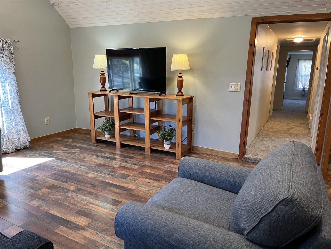 Renovated living area with ROKU TV