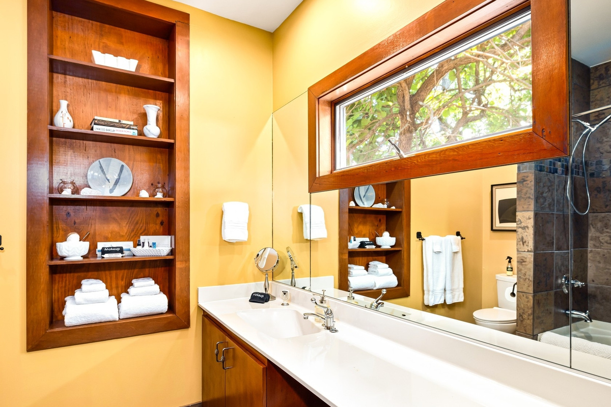Large bathroom for two. Start and end your day watching the birds outside and enjoy artisan lotion, soap, and more.