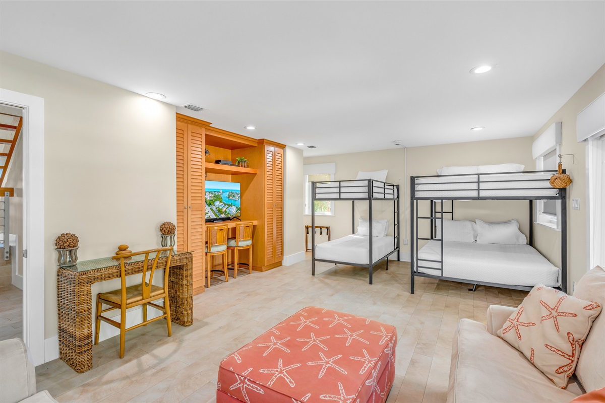 The bunk room can comforably sleep 8 people with two queens, two twins, and a queen size pull out couch.