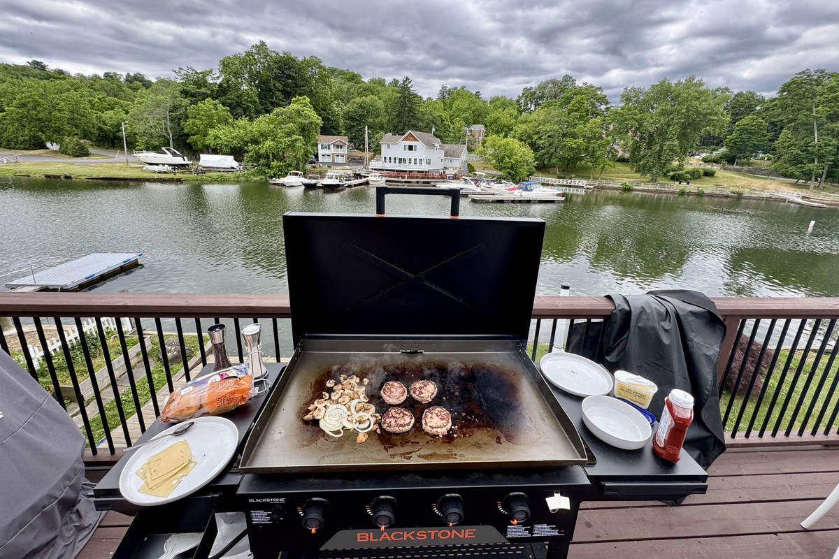 Blackstone griddle with waterfront dining views
