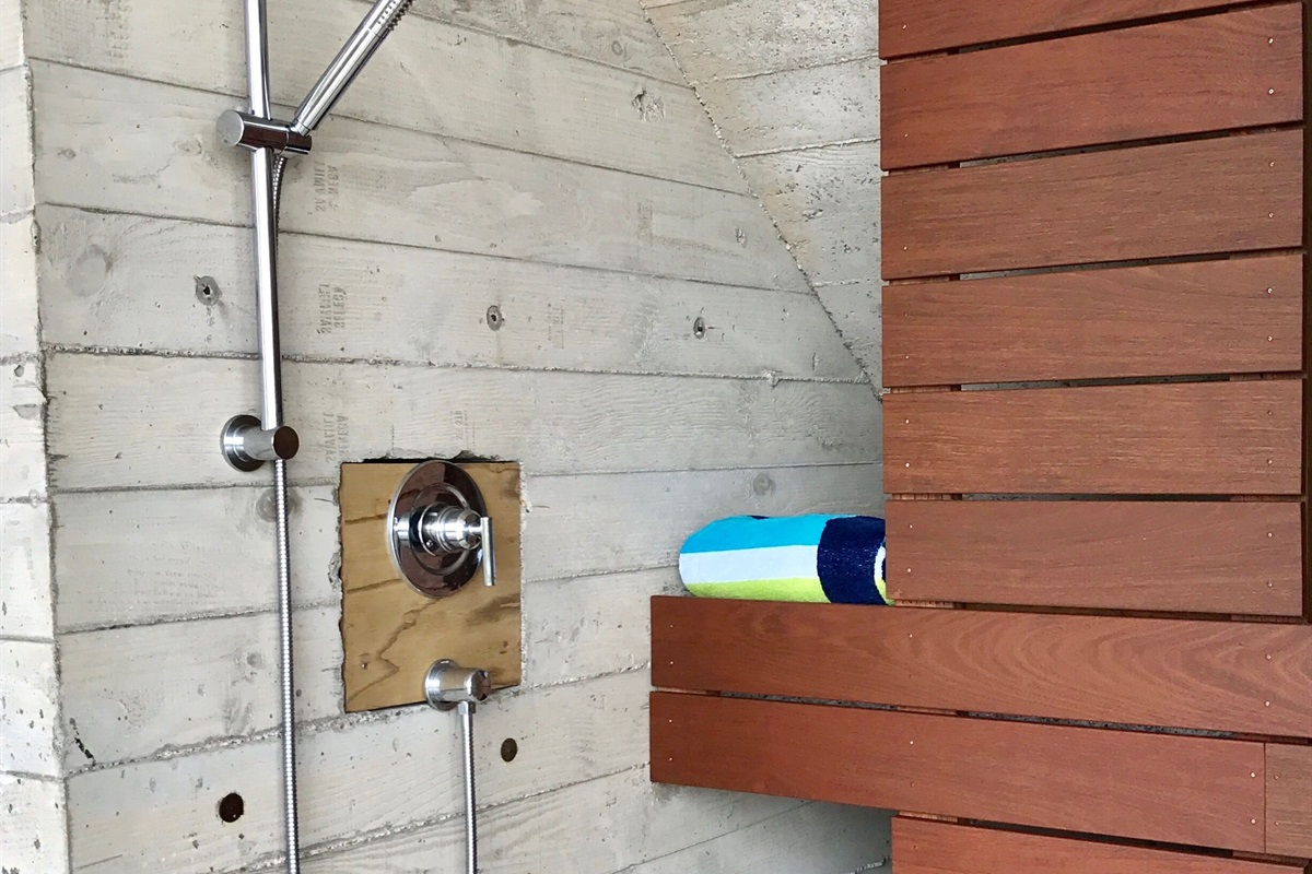 Relax in a warm Outdoor Shower after playing in the surf & sand