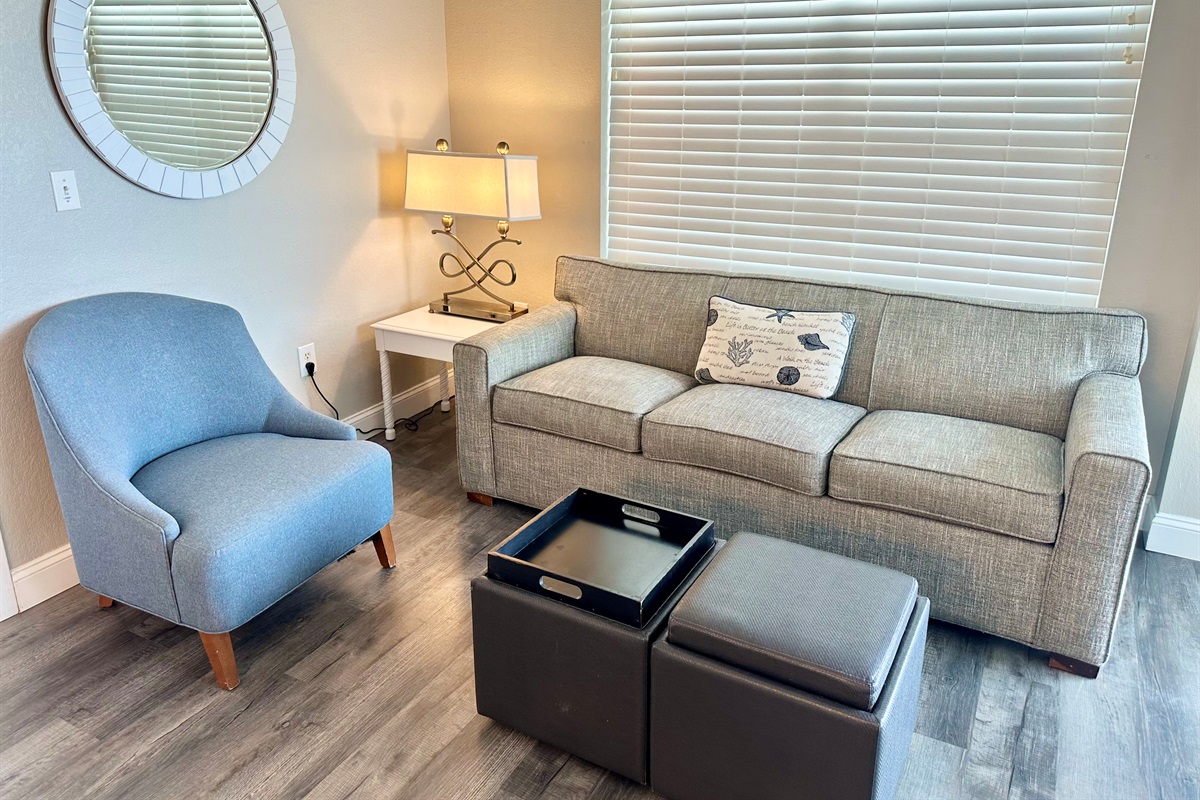 The sofa has a queen sized pull out and the ottomans cushions flip to be tray tables