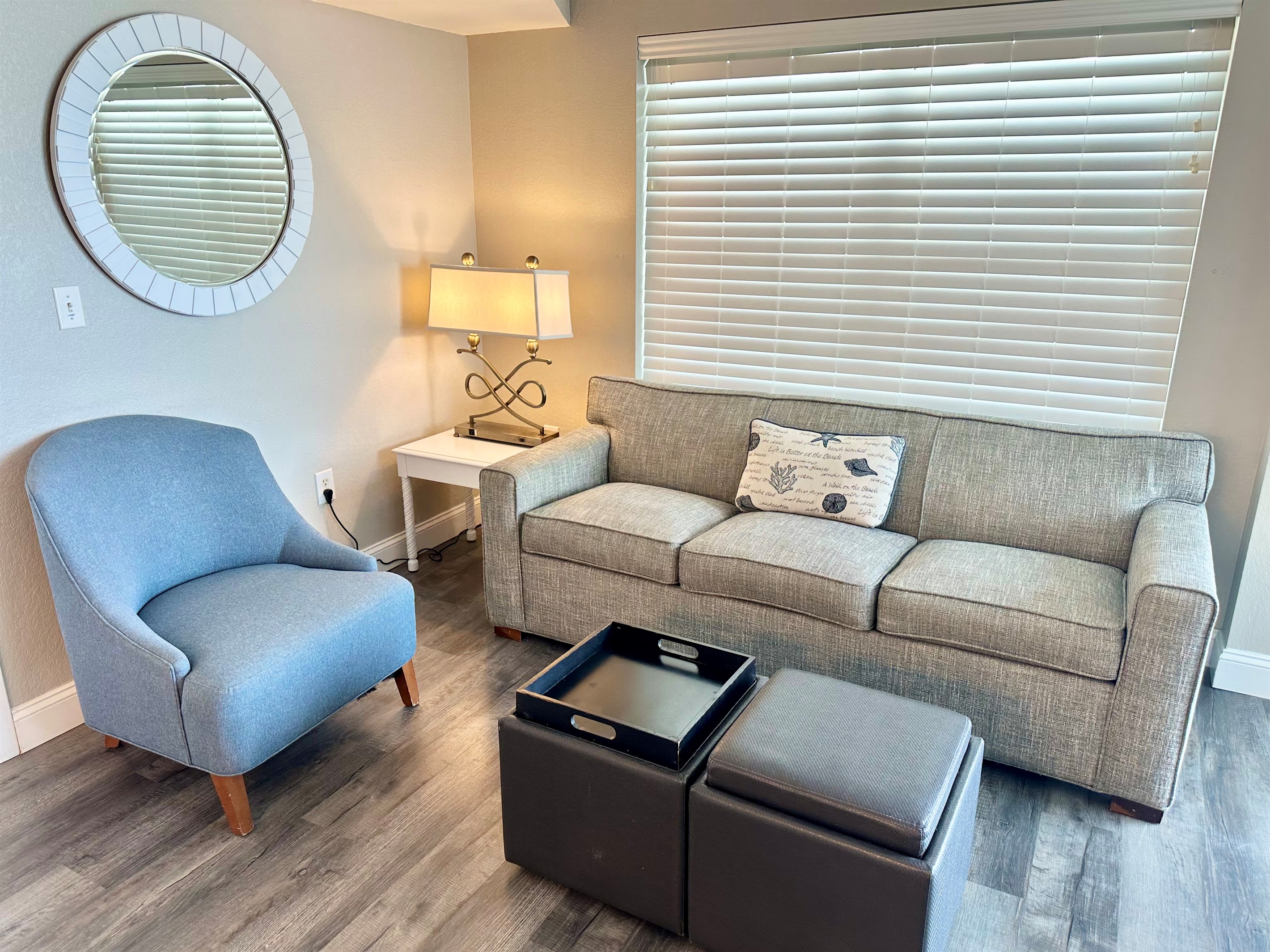 The sofa has a queen sized pull out and the ottomans cushions flip to be tray tables