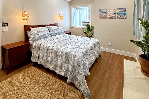 Queen Bedroom 1 | Representative Interior. Finishes, decor, and furniture, vary by duplex unit.