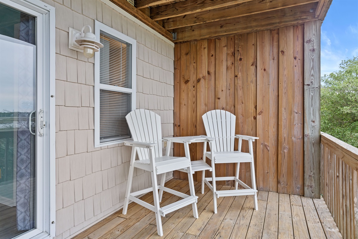 Private nook with bar-height chairs&mdash;perfect for morning coffee or sunset drinks