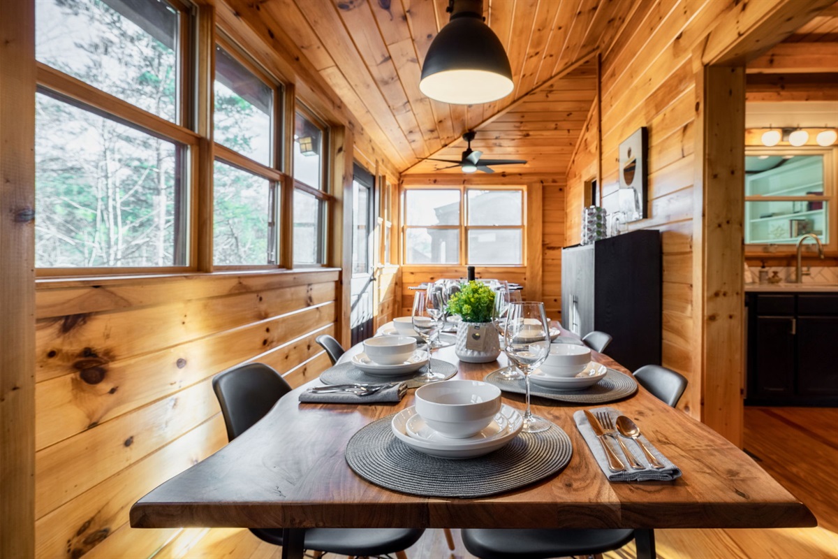 Unwind in our cozy cabin with all the comforts of home, including charming dinnerware to elevate your dining experience.