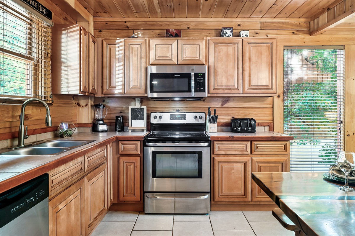 Cook, snack, and gather in a bright open kitchen designed for shared meals and easy together time.