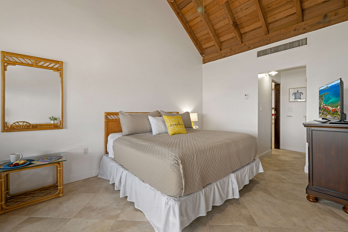 Unwind in a serene bedroom designed with comfort and relaxation in mind.