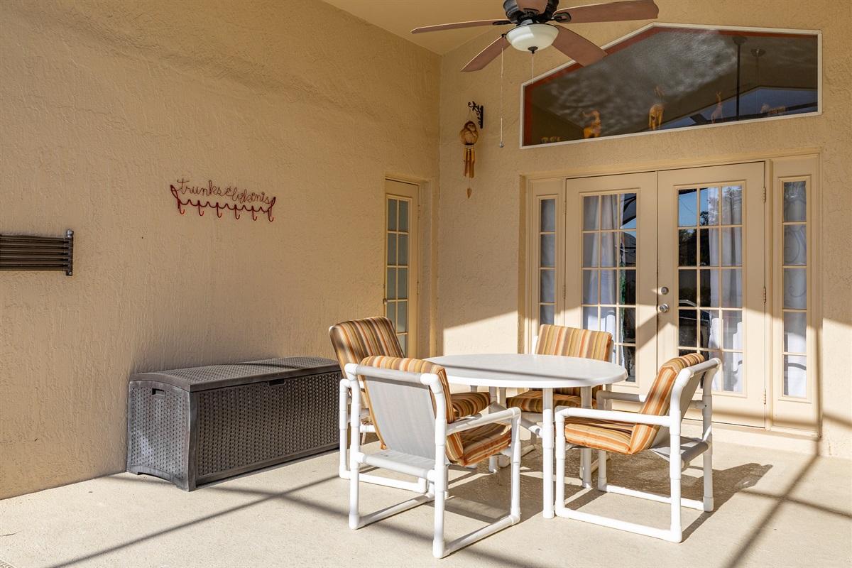 The covered lanai shields you from sun and rain.