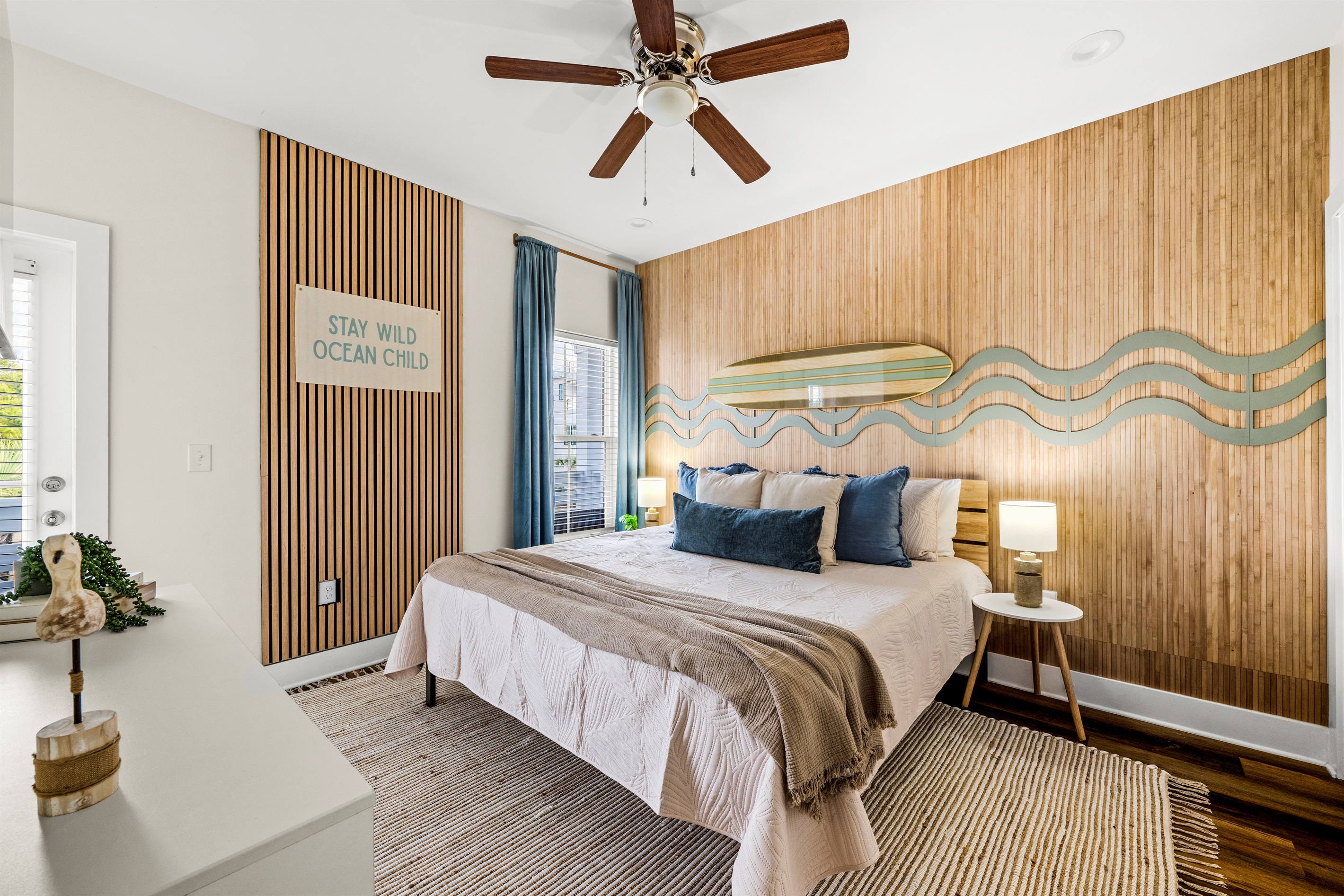 Surf inspired style meets cozy comfort. This unique bedroom brings relaxed beach vibes and a calm place to unwind after a day in the sun.