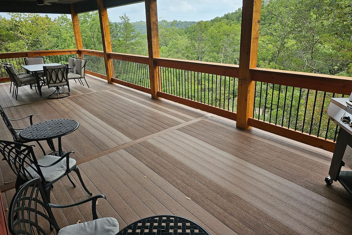 Take in peaceful wooded views from the expansive covered deck.
