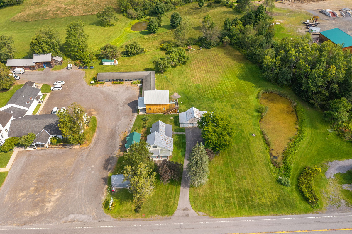 An overhead look at the shared pond and neighboring 1825 rentals.
