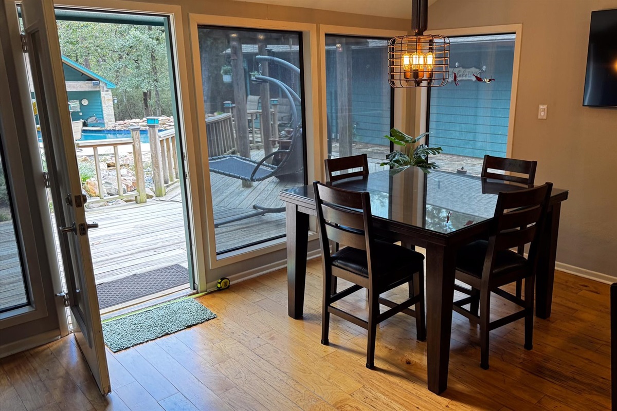 No steps to the outside deck from the kitchen/dining area.