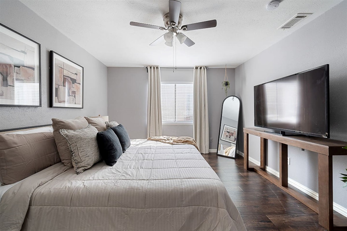 Find refreshment in the master bedroom with a king-sized bed and a private, attached bathroom for your ultimate comfort