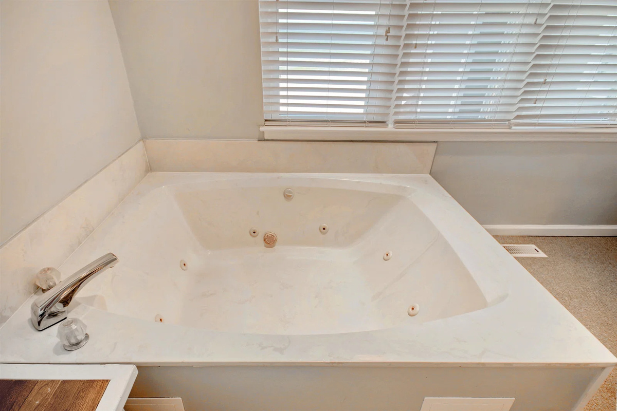 Jetted tub with a view of the ocean