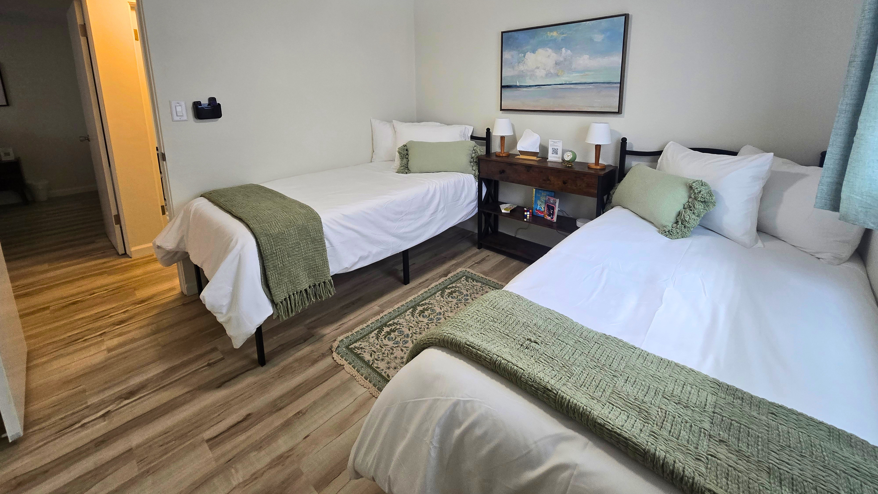 Serene Twin XL bedroom with calming sage accents and room to recharge.