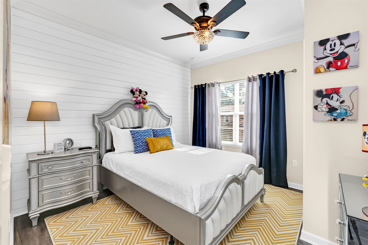 Guest room with touches of Disney, and a queen bed!