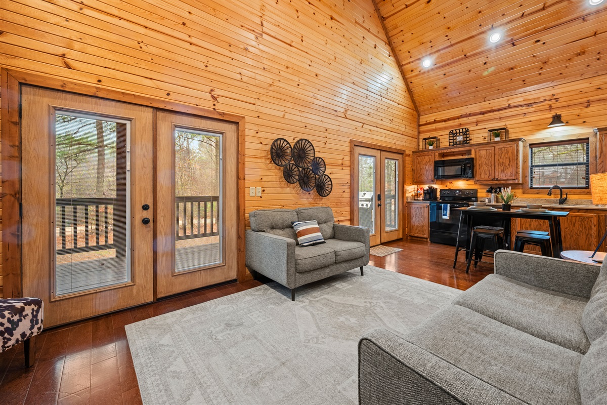 The open-concept design connects the living room, kitchen, and dining area for easy gathering and flow.