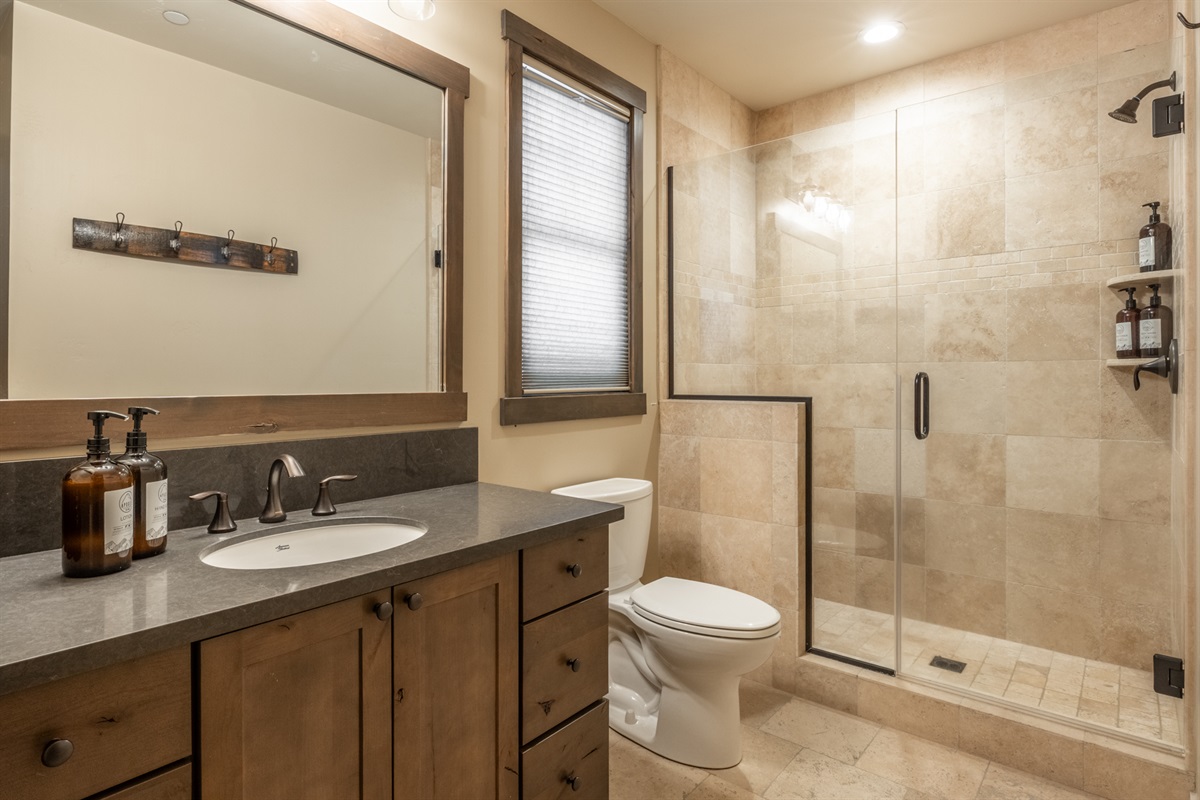 Clean lines and a walk-in shower provide simple, modern functionality.