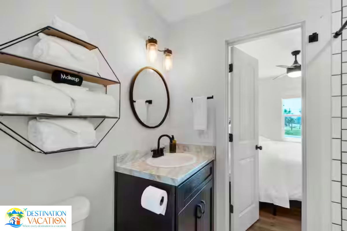Stylish bathroom adds comfort and modern coastal elegance.