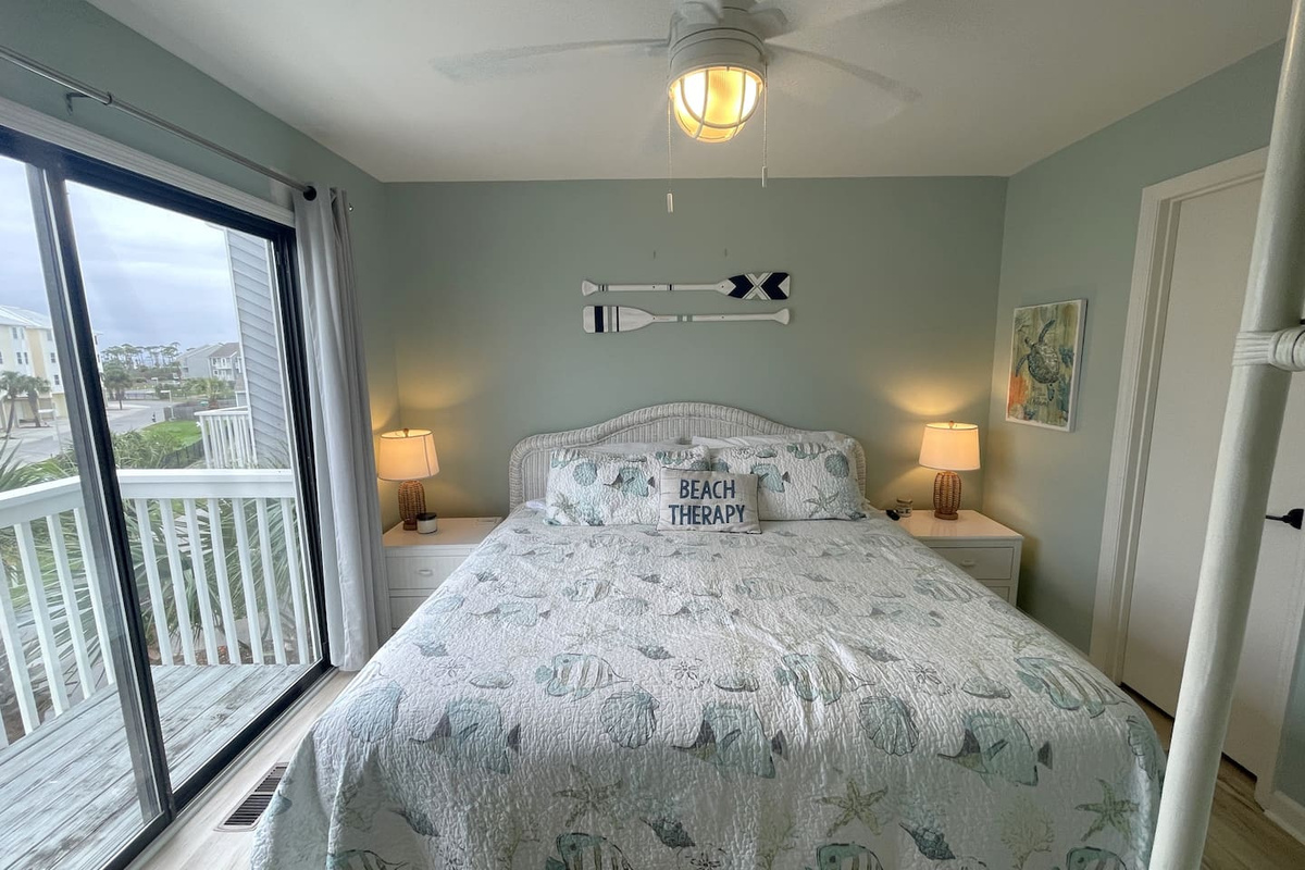 Your guests get their own king suite too &mdash; not a consolation bedroom. Private bath, private balcony, nobody's second-choice here.