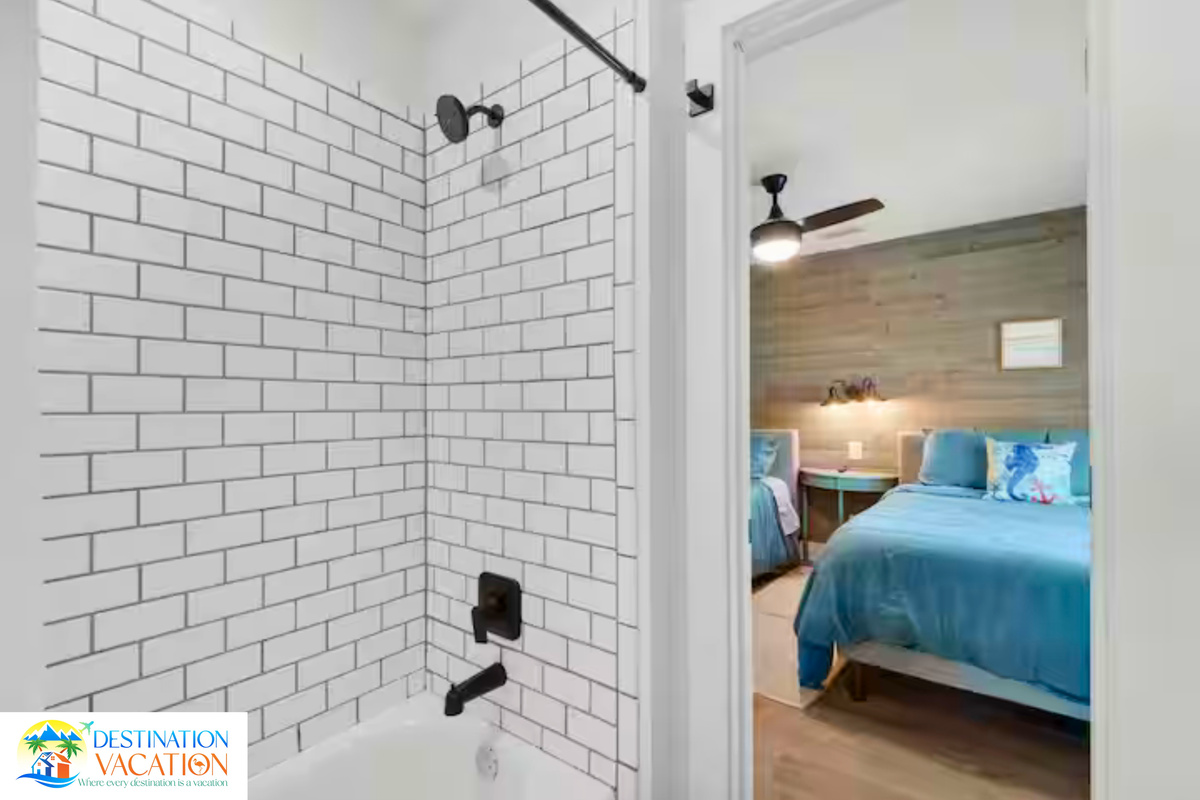 Crisp tilework creates a fresh, spa-inspired bathroom.