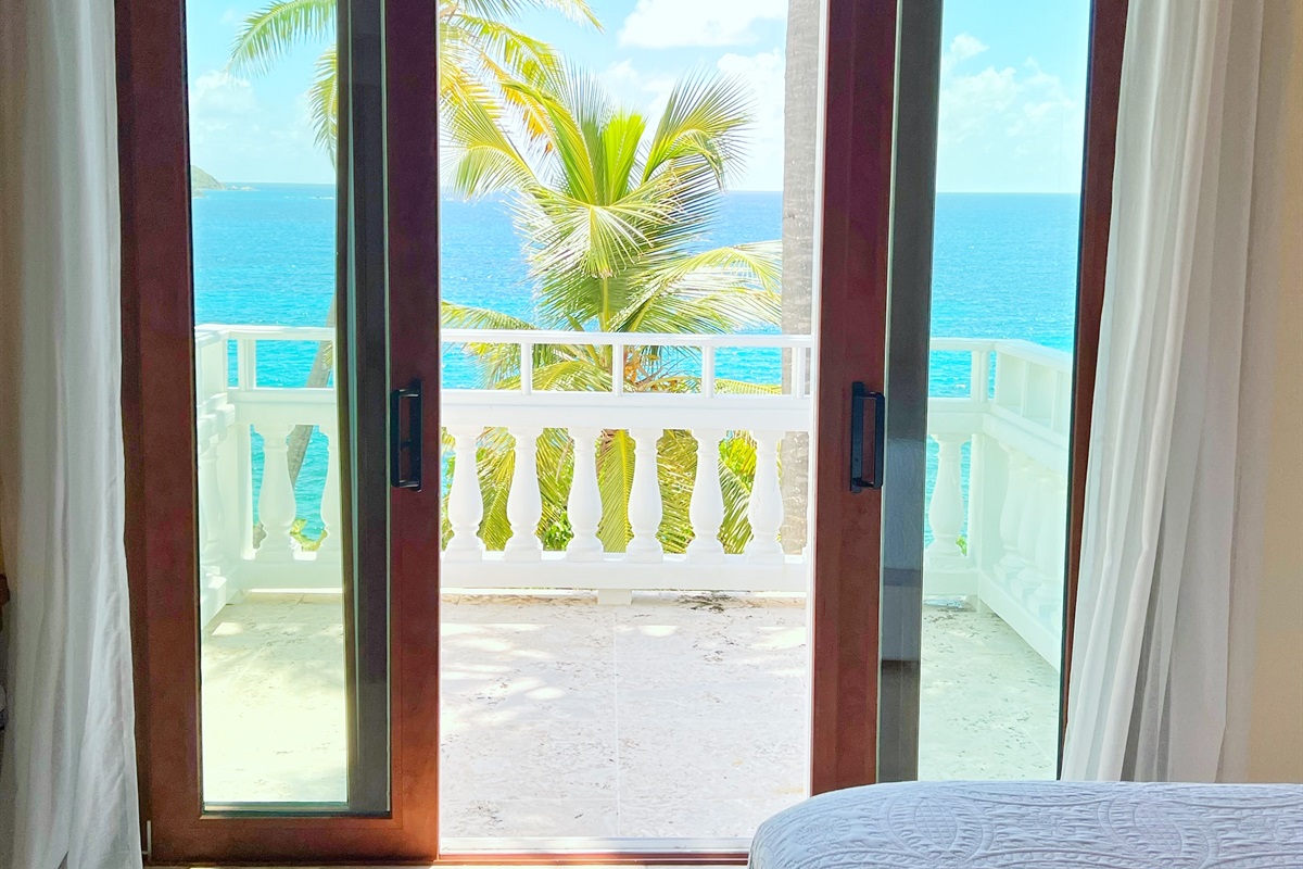 Bedroom opens onto a private terrace for morning inspiration.
