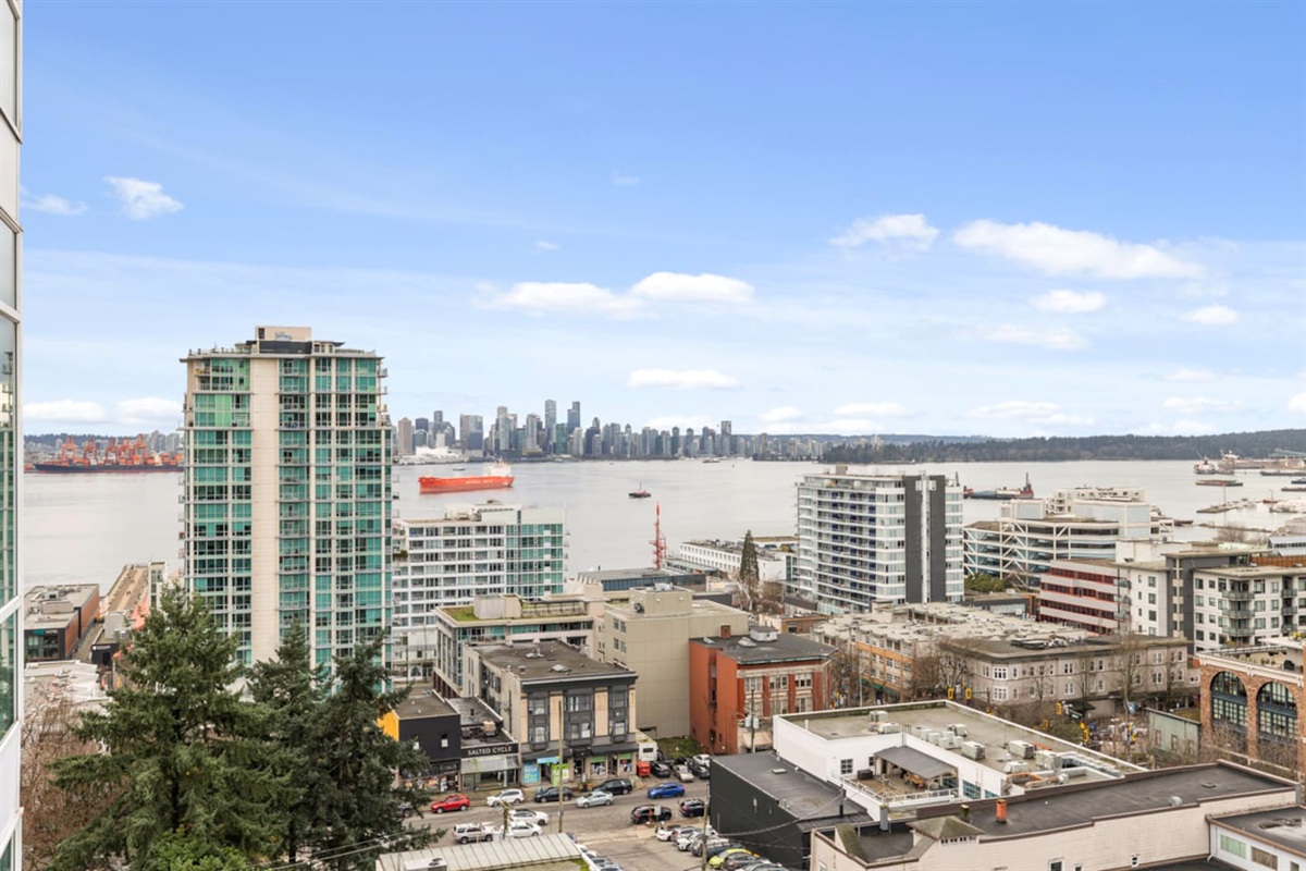 View from your balcony over to downtown Vancouver, the Shipyard's district & pier, Stanley Park and Lions Gate Bridge.