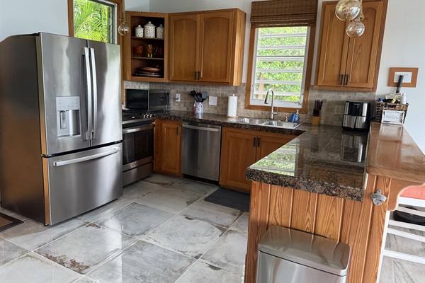 Well-stocked kitchen with updated appliances.