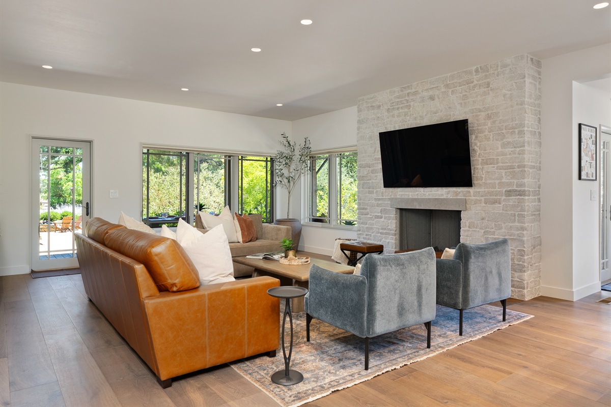 Living Room with Fireplace & Large Windows