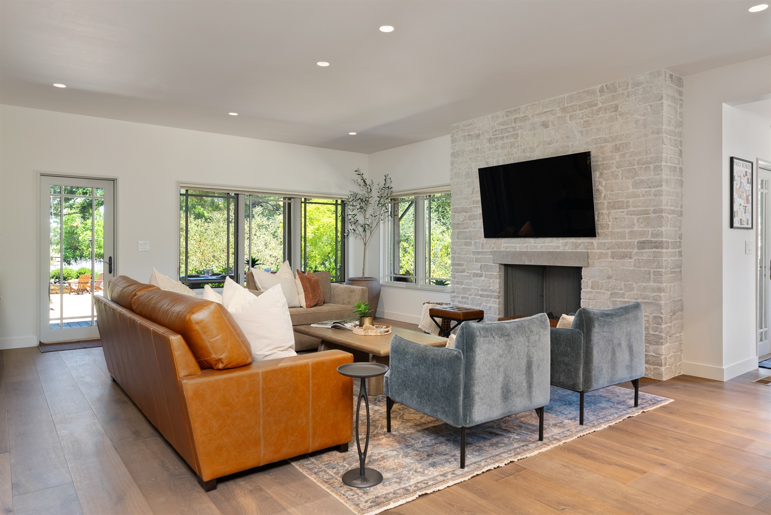 Living Room with Fireplace & Large Windows