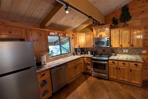 Our spacious kitchen is fully equipped and ready for you to cook delicious meals!