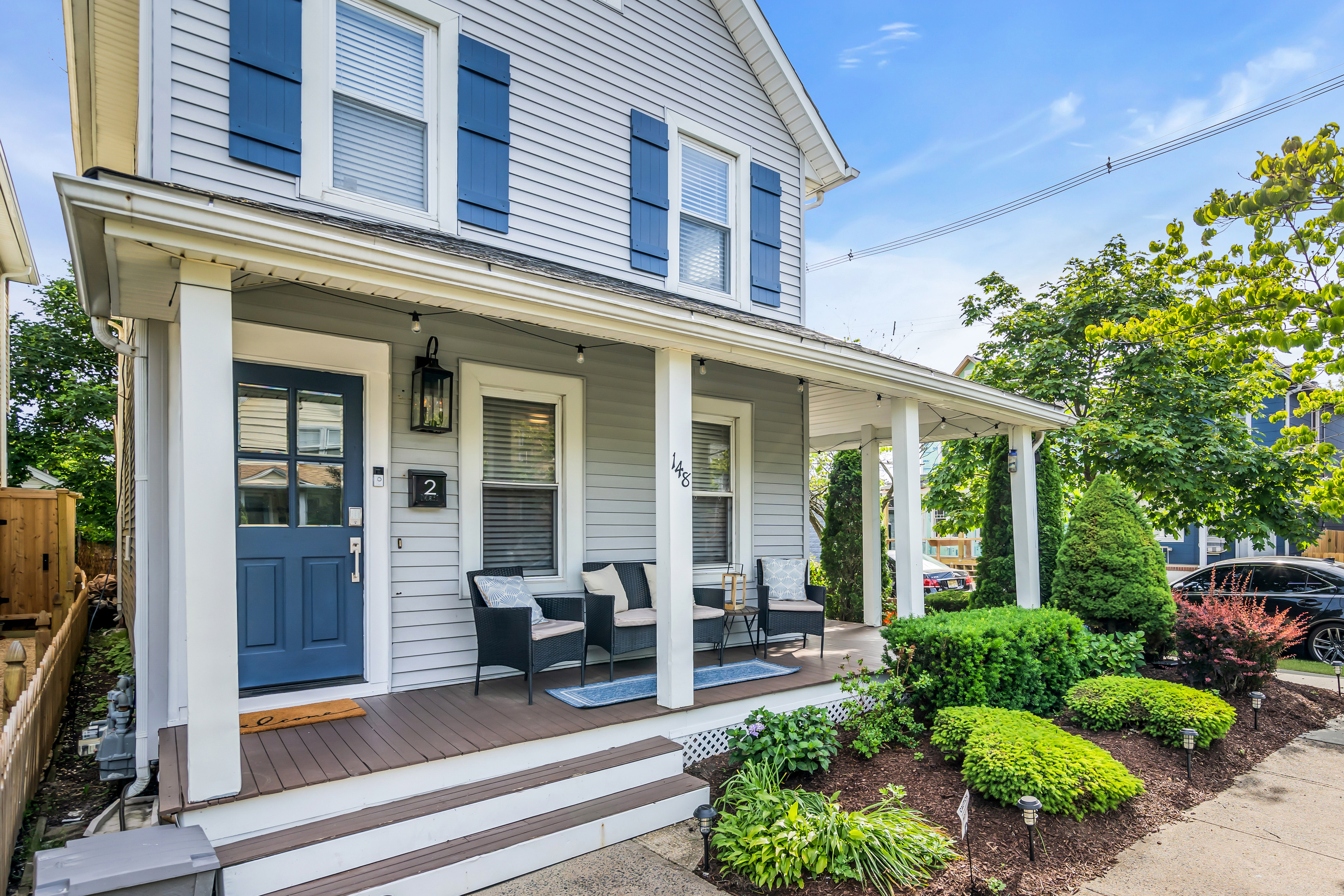 Start your mornings with coffee or end your evenings with conversation on this charming front porch