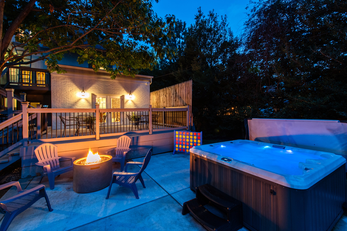 Hot tub, fire pit and back deck area