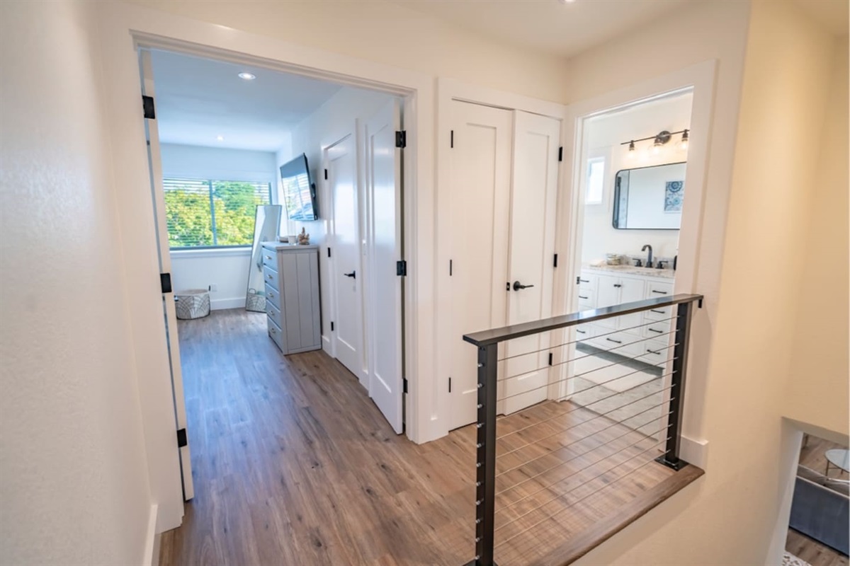 Upstairs Hallway to Master Suite & Shared Bathroom