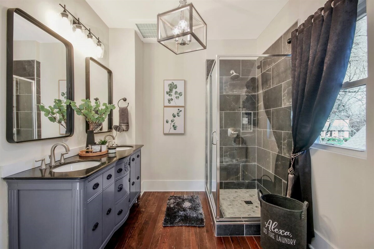 Master Bedroom on-suite.  Full glassed in shower and two sink vanity.