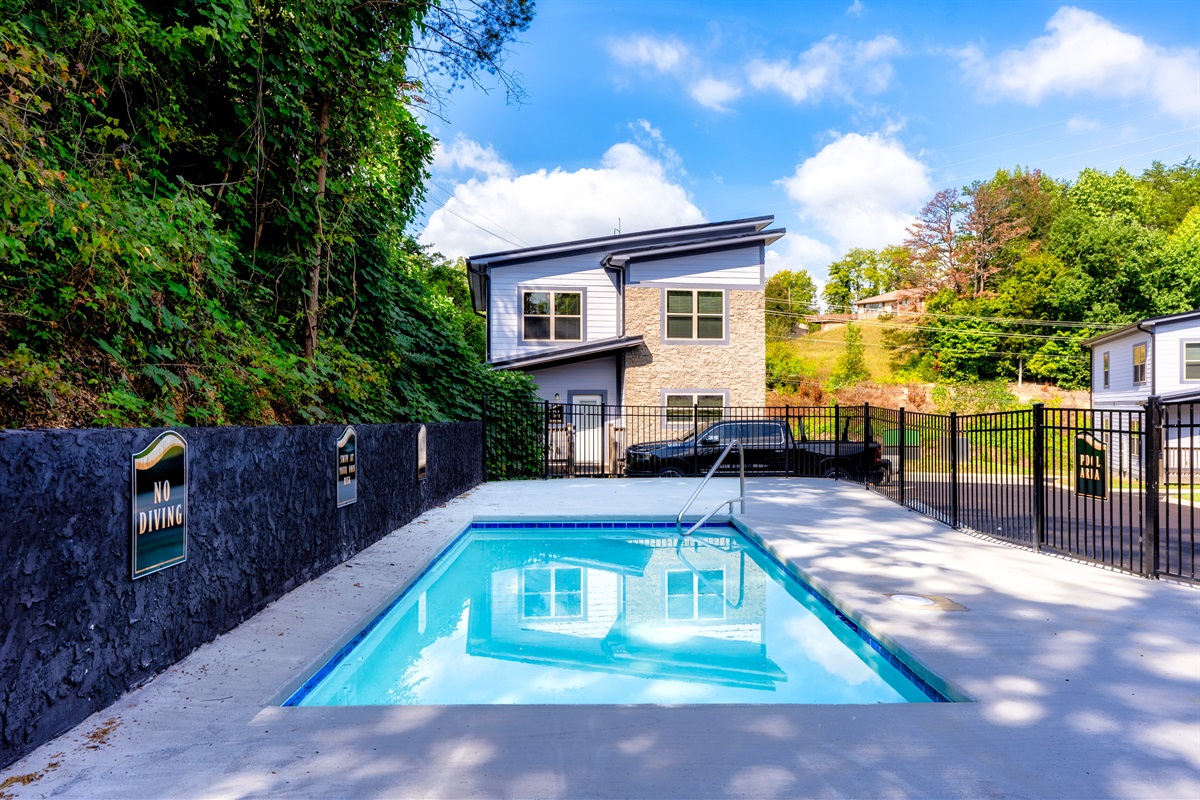 Take a refreshing dip in the sparkling pool or watch your kids enjoy endless fun at the nearby playground.