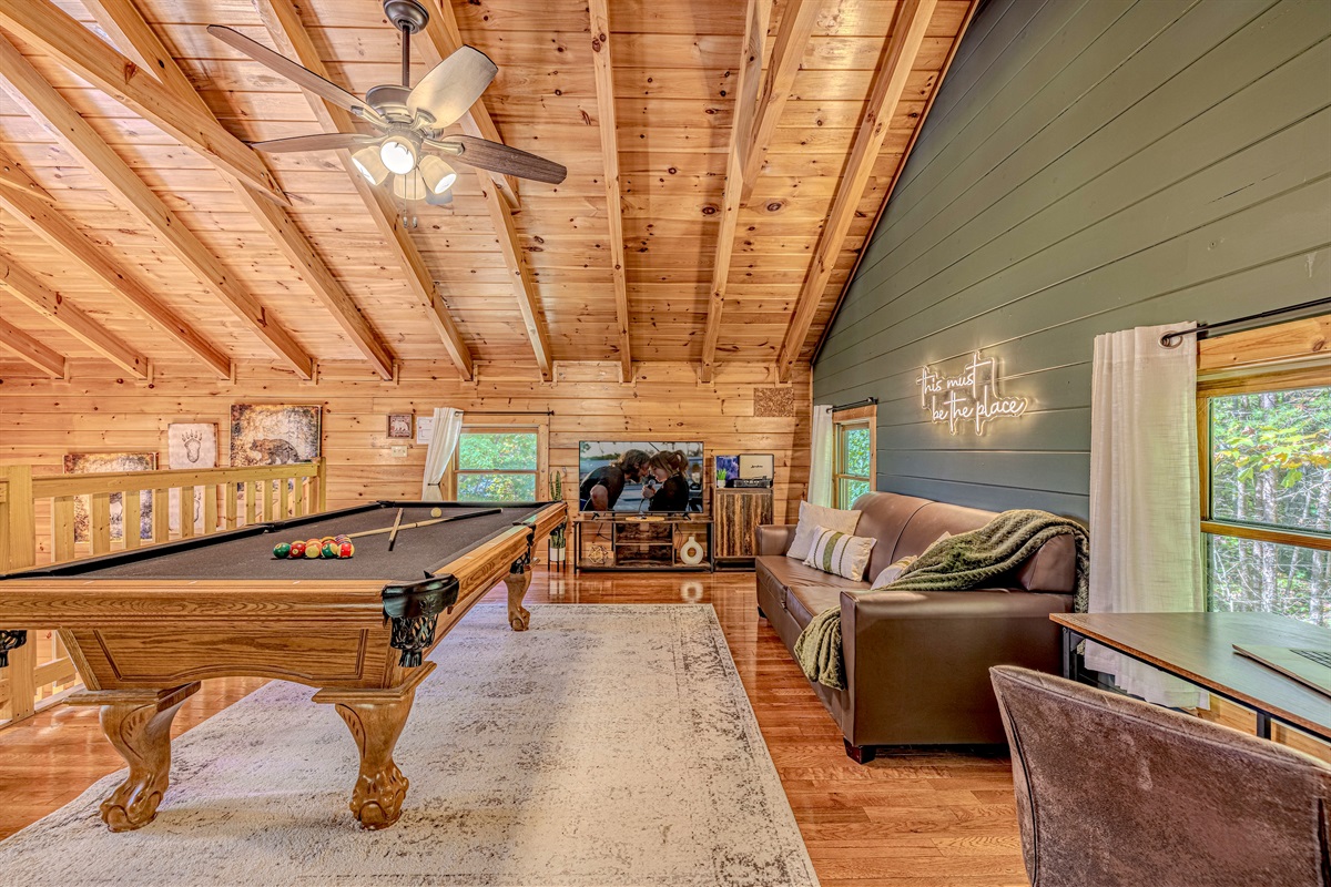 Game loft fun! Enjoy pool, classic arcade games, and movie nights all in one space