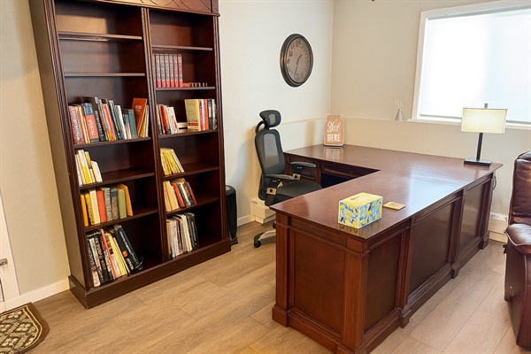 Executive desk, chair and bookshelf