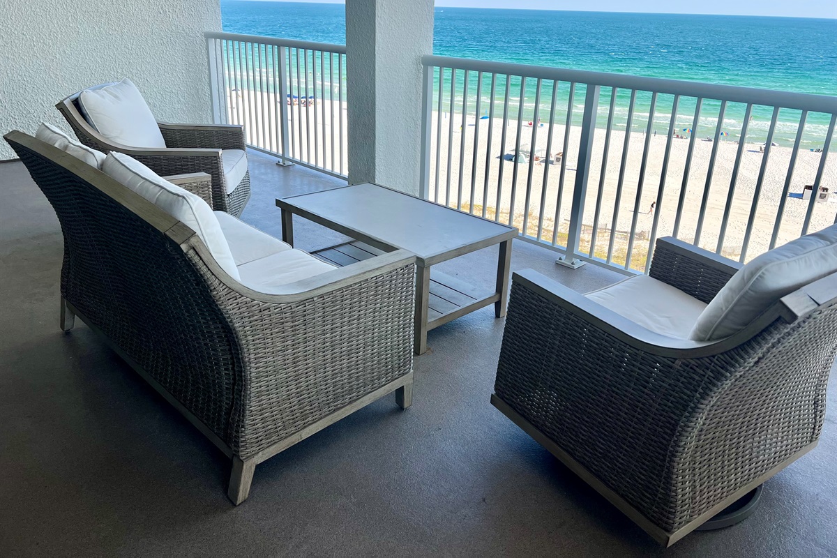 Spacious balcony patio with comfy furnishings
