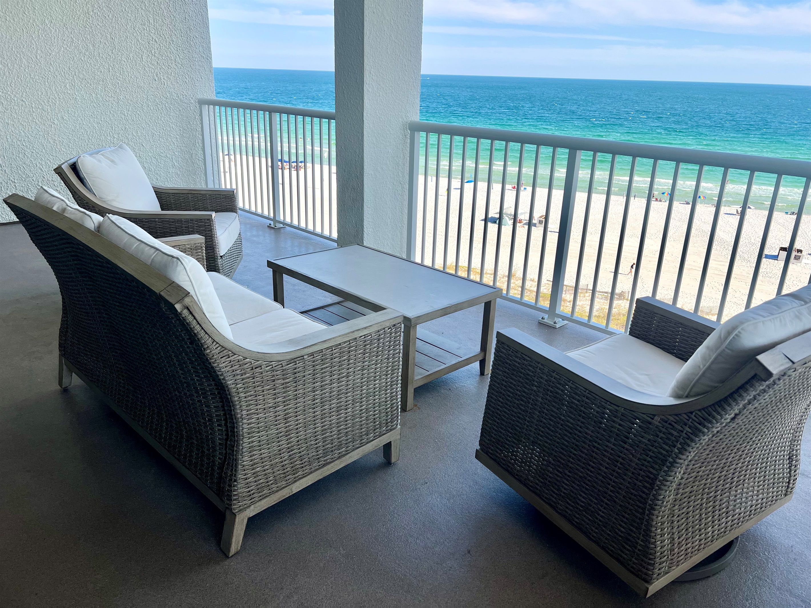 Spacious balcony patio with comfy furnishings