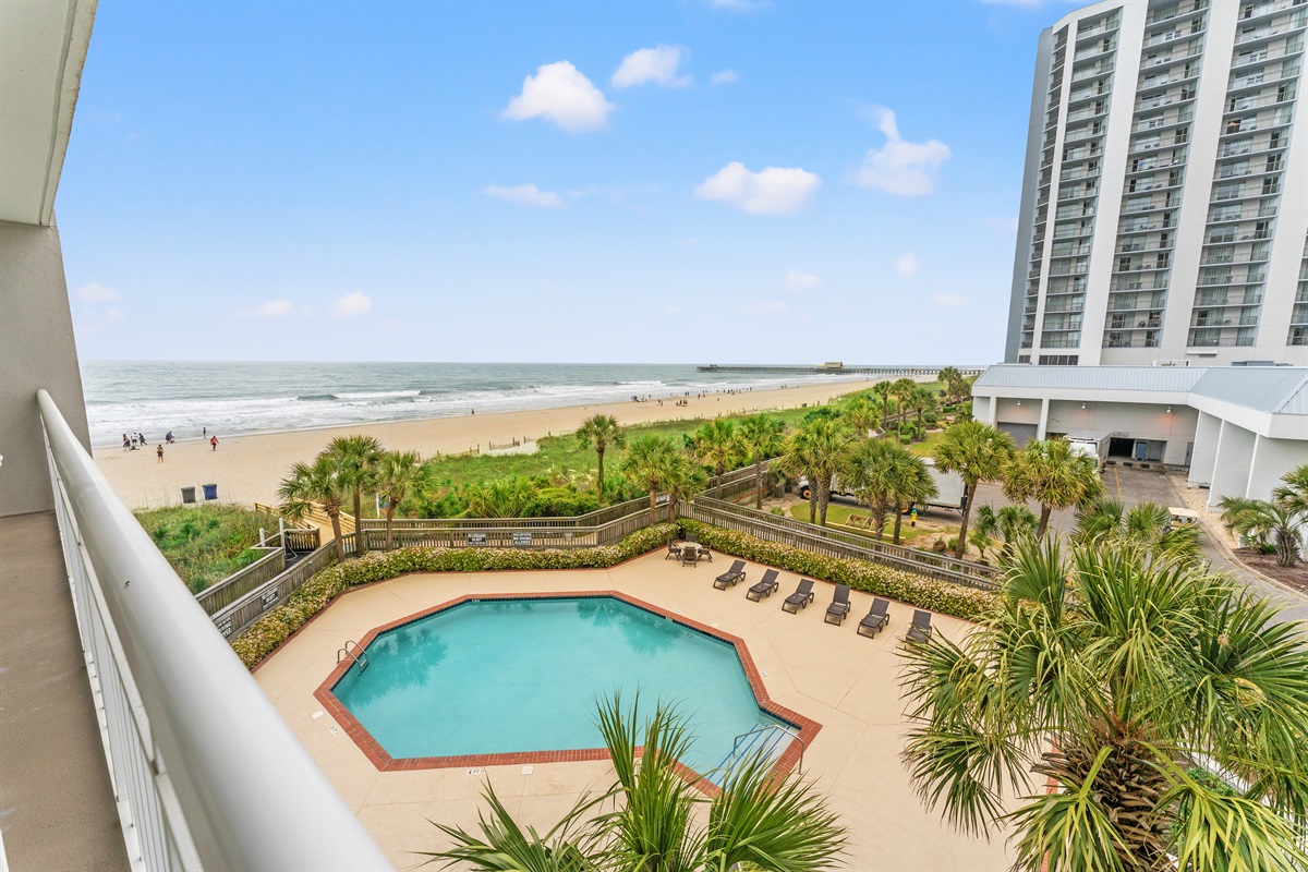 Balcony views overlooking pool