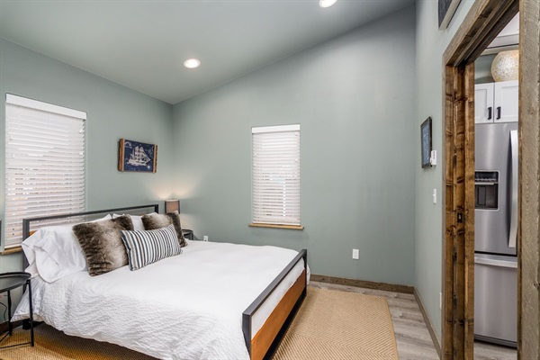 Back bedroom with premium green tea memory foam Queen size bed.