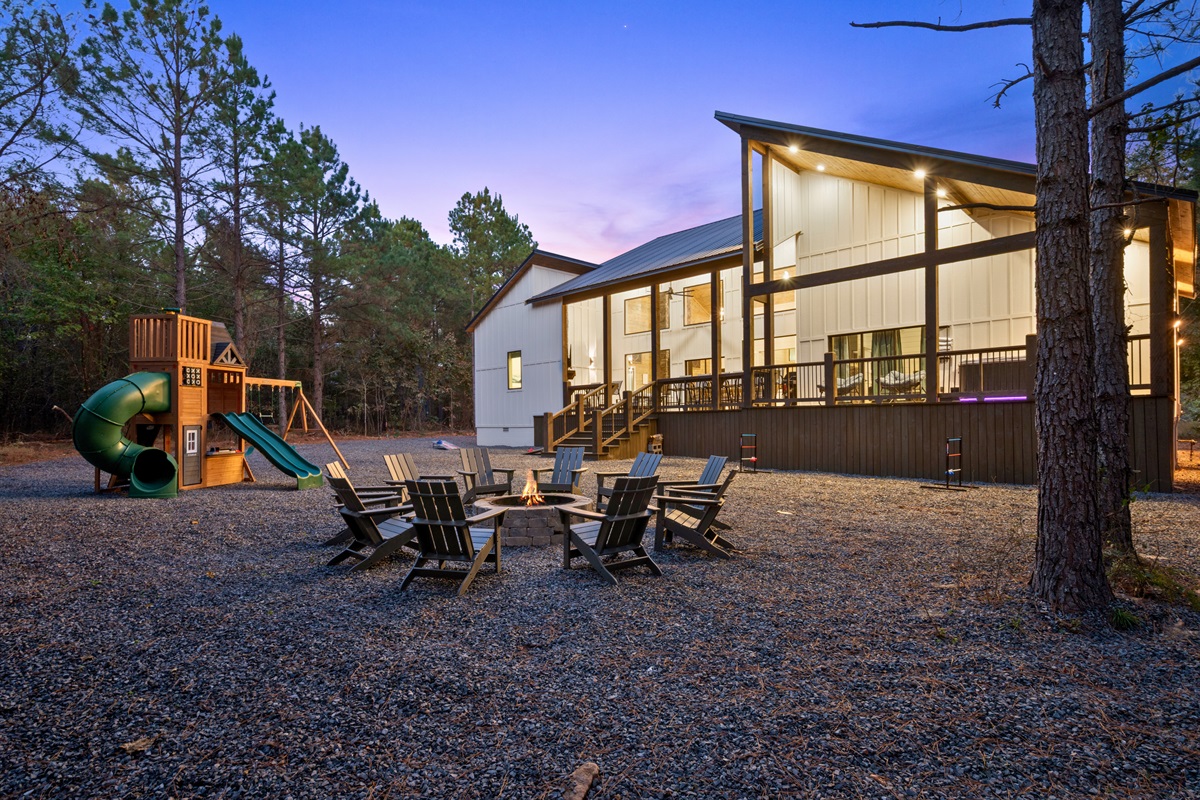 This wide-open outdoor area has everything you need for connection and play—from a fire pit to a playground just steps away.